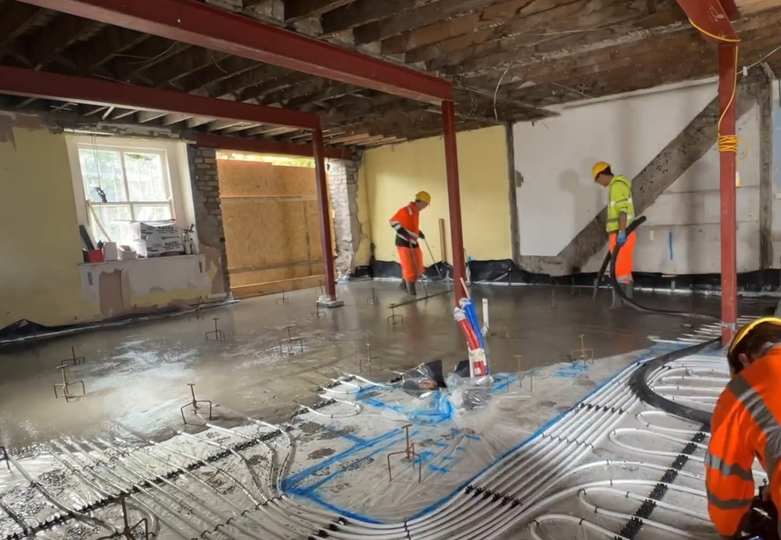 Liquid Floor Screed being poured